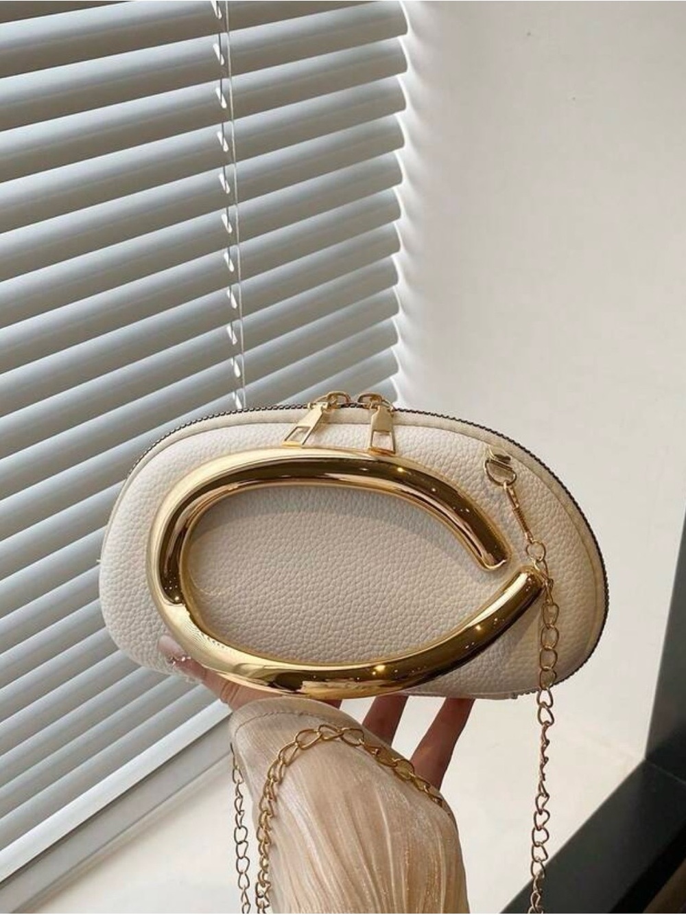Elegant Cream Crossbody Bag with Gold Accent